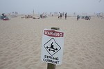 CHATHAM, MA - AUGUST 22: A sign warns beachgoe...